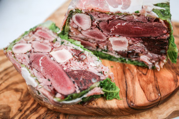 A meat terrine on a wooden board