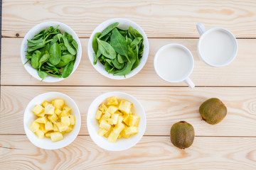 Ingredients for Smoothie (Spinach Leaves, Almond Milk, Pineapple, Kiwi)