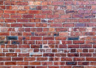 old rough textured red brick wall background