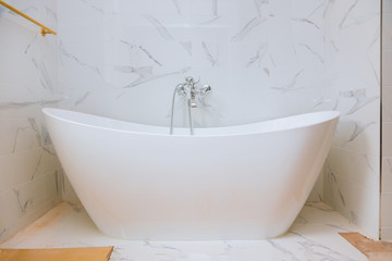 Classic bathroom interior with tiles of modern bathroom installing in the custom house