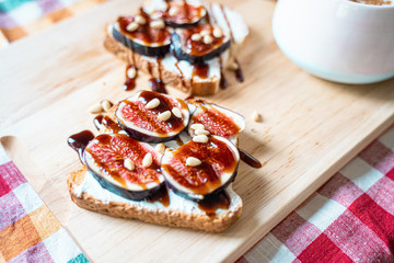 Breakfast Concepts, Toasts with Cream Cheese, Figs, Pine Nuts and Raspberry Balsamic Sauce