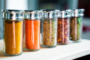 Different Kinds of Spices (Turmeric, Chilli Pepper, Chilli Pepper Powder, Rosemary and Bay Leaf)