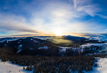 Picturesque winter panorama of mountain hills