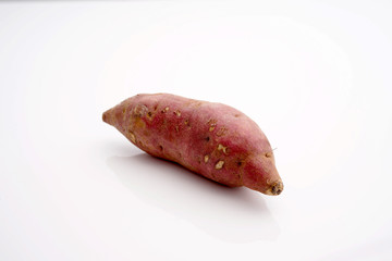 Japanese sweet potatoes on white isolated background