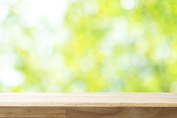 Empty white table and blurred garden bokeh background. mock up for display or montage of product, Business presentation.