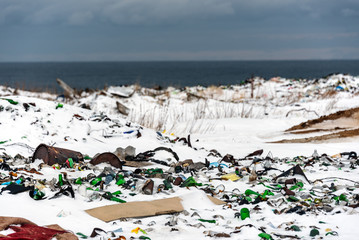 Illegal trash dump in the Arctic snow polluting the pristine environment