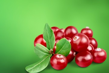 Red cranberries isolated on background