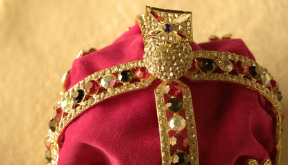Gold crown with luxury color jewels and diamonds. With reflection and lights sparks.