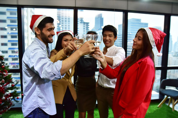 A group of office workers are celebrating Christmas and Happy New Year.,X Mas and New year party