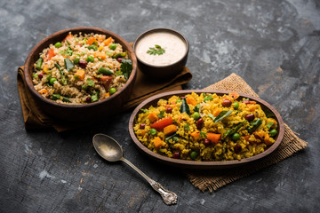 Broken wheat or Daliya Upma, served in a bowl. selective focus