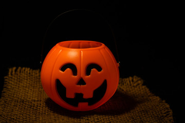 Halloween pumpkin on dark background with space for text