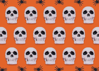 Skull pattern on orange background.