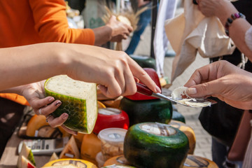 Cheese tasting at the traditional farmers market