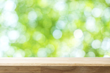 Empty white table and blurred garden bokeh background. mock up for display or montage of product, Business presentation.