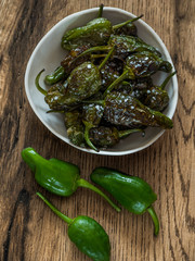 Fried Padron peppers in a plate