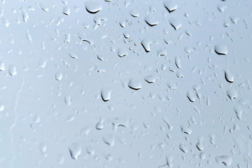 Background with drops of water on glass