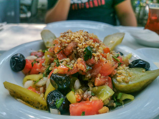 salad with olive and walnut and pickles