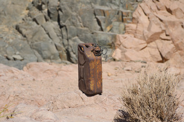 old rusty canister in the desert.