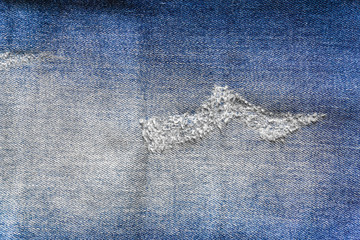 Jeans missing fashion. denim jeans background with seam of jeans fashion design. stitched texture denim background of fashion design. good for background.