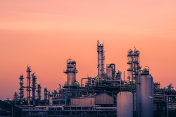 Fototapeta na wymiar Petrochemical plant with sunset sky background, Oil and gas refinery plant, Manufacturing of petroleum industry