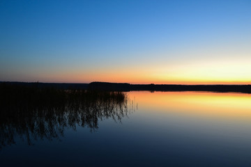 sunset over lake in visaginas