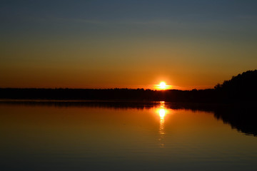 sunset over lake visaginas