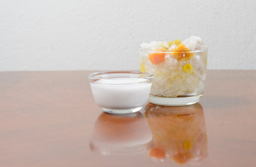 Sticky rice boiled in syrup with corn and sweet potato. Thai dessert