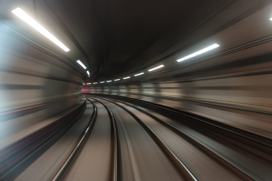 Light trail in an illuminated tunnel, Brazil