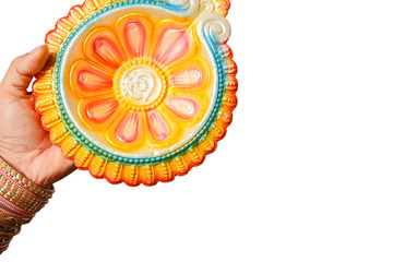 Happy Diwali - Woman hands with henna holding lit candle isolated on white background. Hindu festival of lights celebration. Copy space for text.