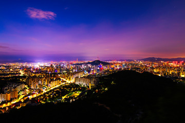 Naklejka premium Twilight of Seoul Downtown cityscape . Aerial view of Nansan Seoul Tower and lotte tower. Viewpoint from Ansan mountain best landmark of Seoul , South Korea