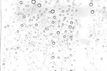 Naklejka na ściany i meble Rain drops on window glasses surface Natural Pattern of raindrops. Natural pattern of raindrops on white background for your design.