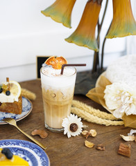 Bale latte. Bale is species of a plant native to South East Asia. Also knows as Aegle marmelos and Bengal quince. Iced coffee with Aegle marmelos, special drink. Soft focus and rustic style.