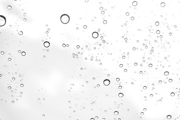 Rain drops on window glasses surface Natural Pattern of raindrops. Natural pattern of raindrops on white background for your design.