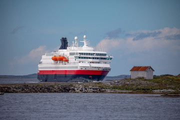  Coastal ships depart from Bronnoysund harbor in  Northern Norway