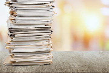 Stack of papers isolated on white background