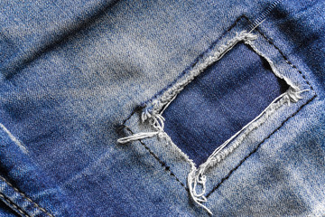 Jeans missing fashion. denim jeans background with seam of jeans fashion design. stitched texture denim background of fashion design. good for background.