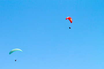 Two paragliders in the sky 
