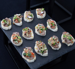 meat sandwich vegetables white bread decorated black