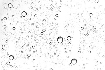 Rain drops on window glasses surface Natural Pattern of raindrops. Natural pattern of raindrops on white background for your design.