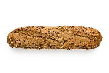Traditional whole wheat baguette with linseeds and sesame seeds isolated on white. Top view.