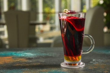 Christmas mulled wine on a wooden table. Traditional hot drink at Christmas (red wine with spices, New Year's Eve, Noel holiday festive) x-mas flat lay. food background. copy space. Top viev