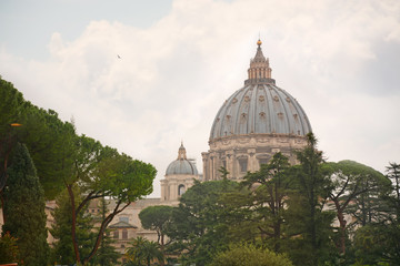 Fototapeta na wymiar Dome of St Peters Basilica in Vatican City, Rome, Italy. Roman Catholic Church