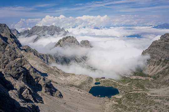 Mountain peaks above clouds, Dolomites, Lienz, Austria