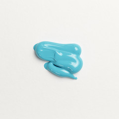 Abstract texture of aqua paint on paper. Brush and paint texture. Minimal creative concept. AI Aqua - color of the year 2021