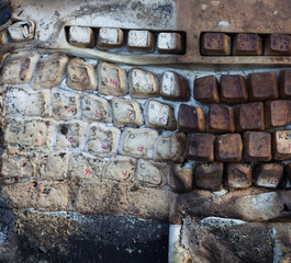 Charred and melted computer keyboard