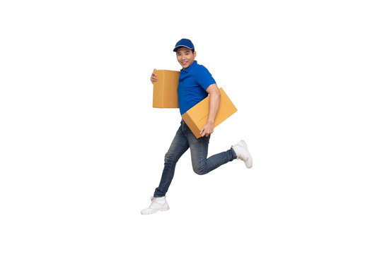 Energetic Young Asian Delivery Man Jumping And Holding Boxes Isolated On White Background, Deliveryman With Parcel Post Box And Fast Shipping Concept