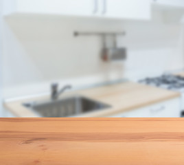 abstract blur inside interior contemporary kitchen loft decoration style with wood plank perspective background for show promote content ,product on disply