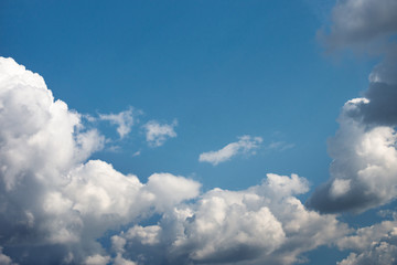 white clouds in the blue sky during