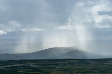 Regenschauer im Dovrefjell, Norwegen