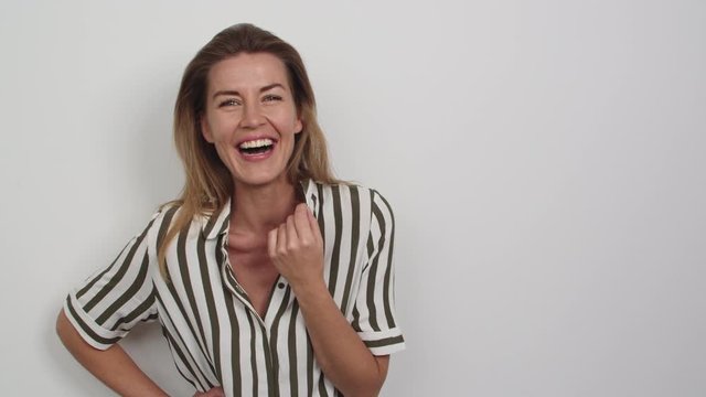 Woman In Striped Top Laughing